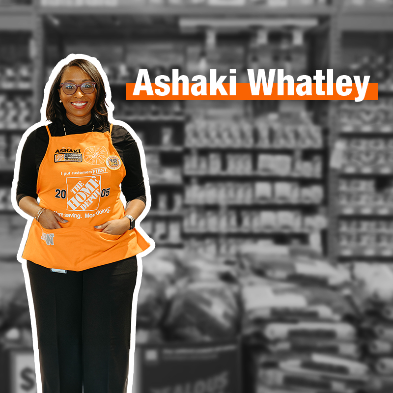Ashaki Whatley in front of the lighting aisle