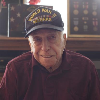 Veteran wearing World War II hat