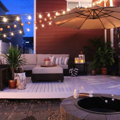Patio featuring string lights and LED candles